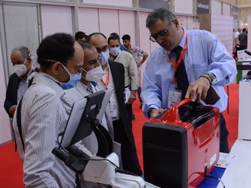 A visitor trying out new medical devices at EgyMedica